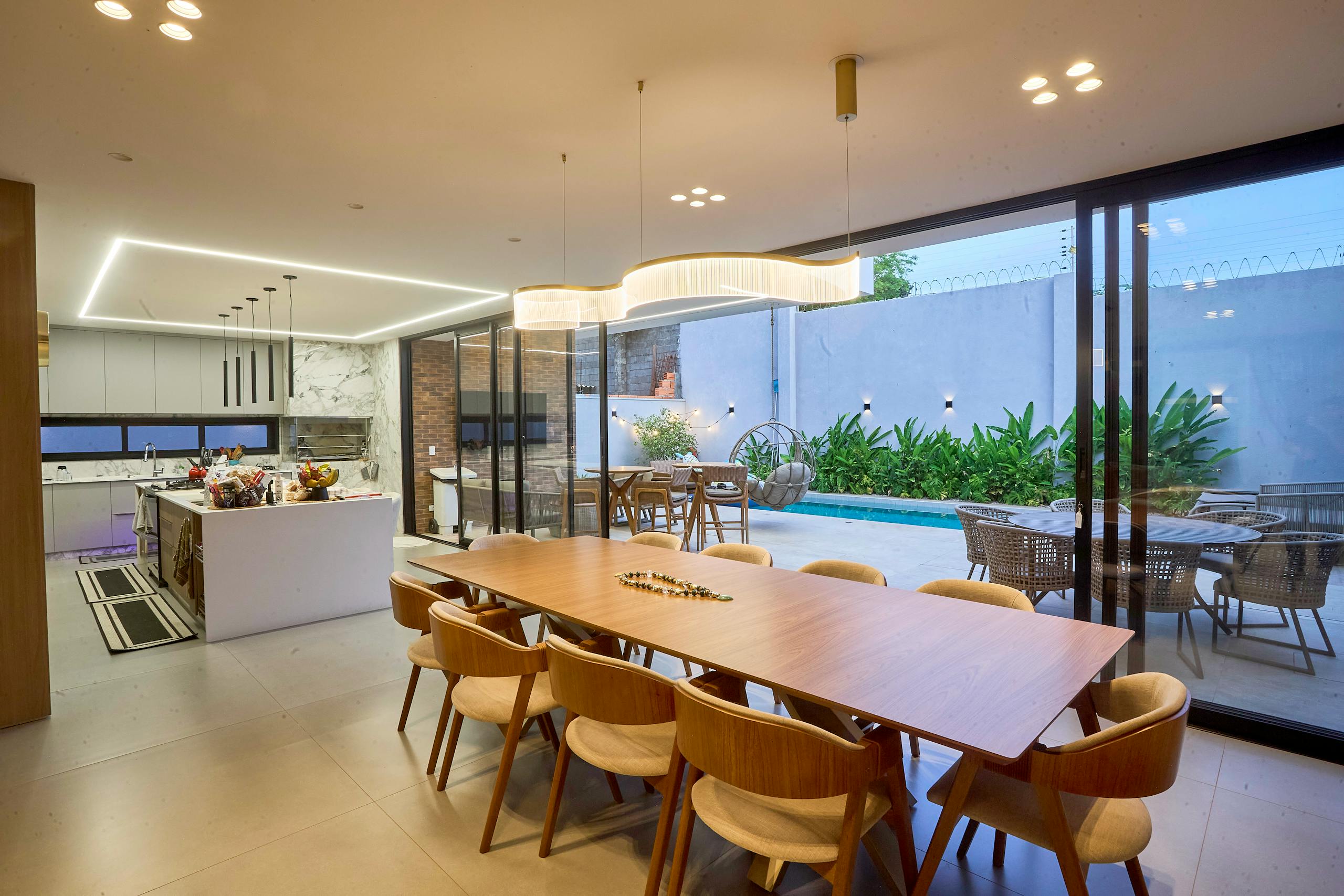Luxurious dining space with pool access, ideal for contemporary living.